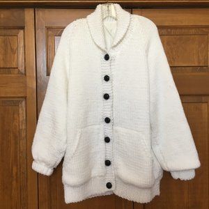 Sweater/Jacket with Curler on back.